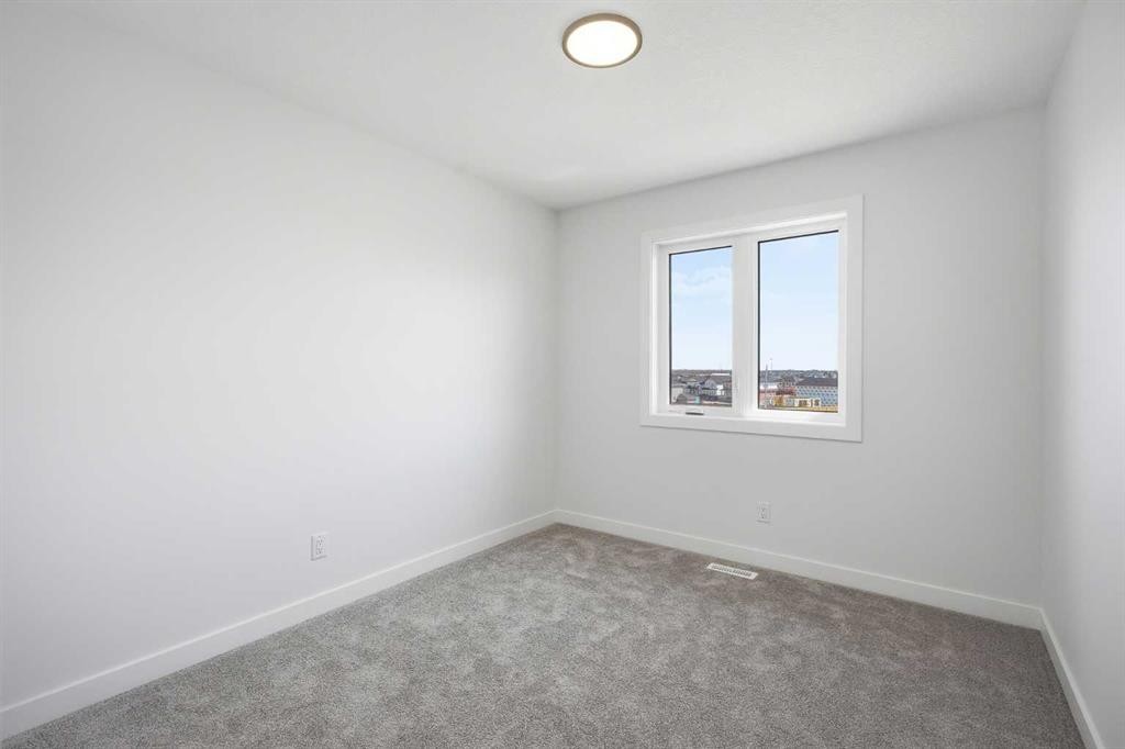 217 Bridgeport Gate, Chestermere, AB - Indoor Photo Showing Other Room