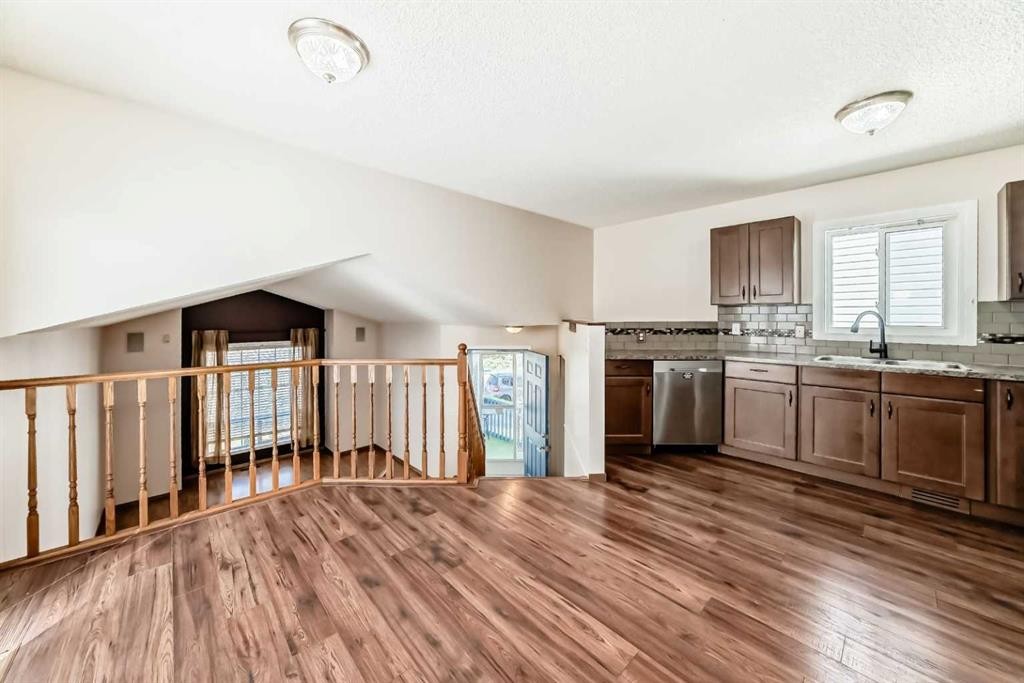51 Covington Rise Ne, Calgary, AB - Indoor Photo Showing Kitchen With Double Sink