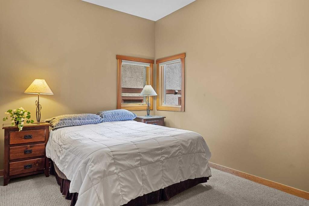 214 Eagle Point, Canmore, AB - Indoor Photo Showing Bedroom