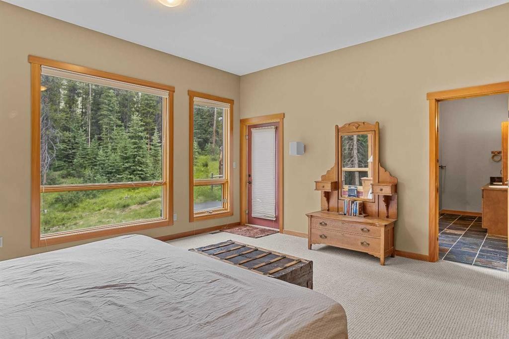 214 Eagle Point, Canmore, AB - Indoor Photo Showing Bedroom
