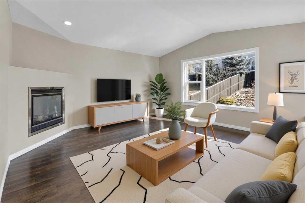 24 Evansbrooke Point Nw, Calgary, AB - Indoor Photo Showing Living Room With Fireplace
