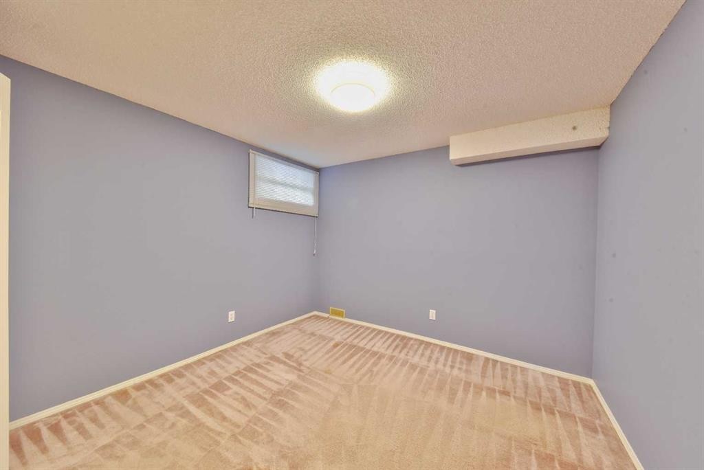 105 Coral Springs Close Ne, Calgary, AB - Indoor Photo Showing Other Room