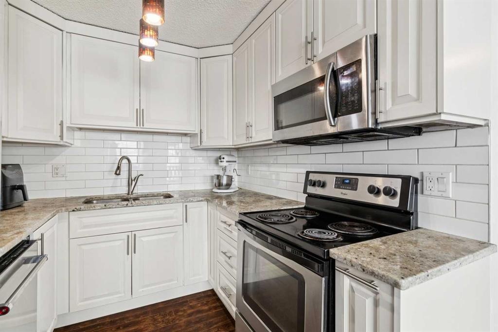 28 Templegreen Bay Ne, Calgary, AB - Indoor Photo Showing Kitchen With Stainless Steel Kitchen With Upgraded Kitchen