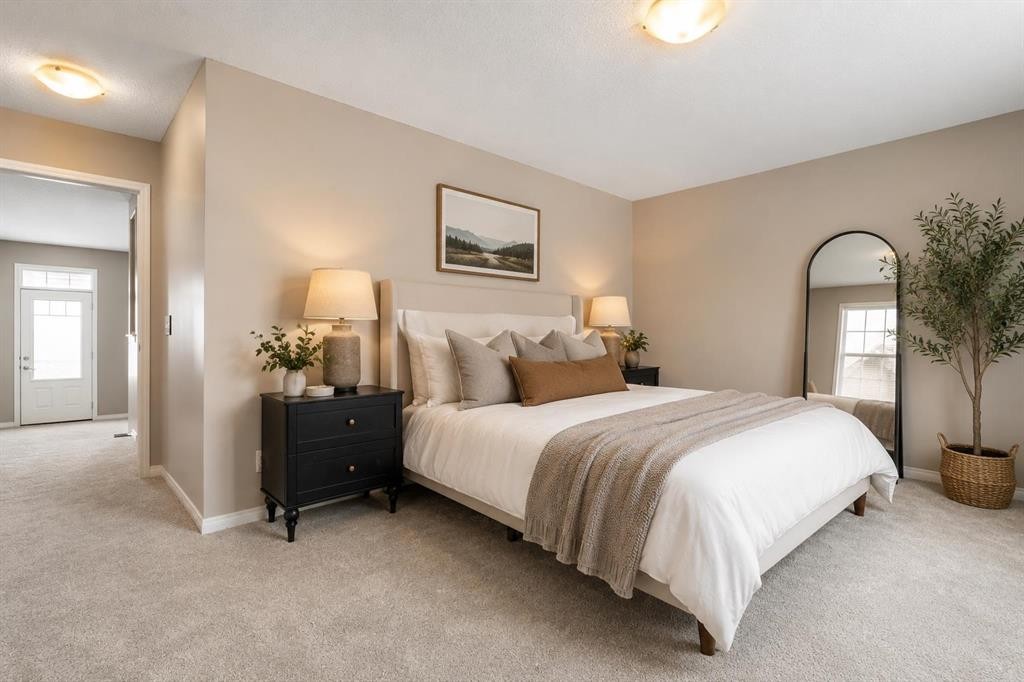 149 Windridge Road Sw, Airdrie, AB - Indoor Photo Showing Bedroom