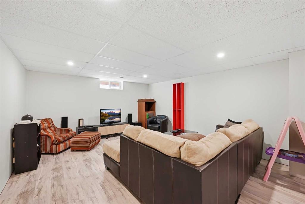 1012 Riddell Place Se, Calgary, AB - Indoor Photo Showing Basement