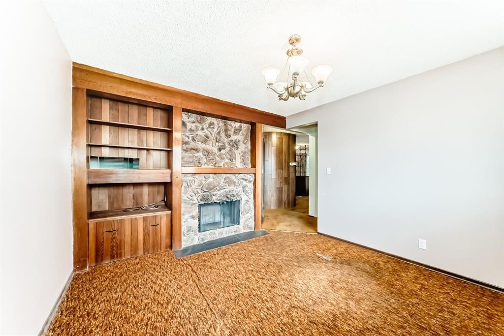 619 Maryvale Way Ne, Calgary, AB - Indoor With Fireplace