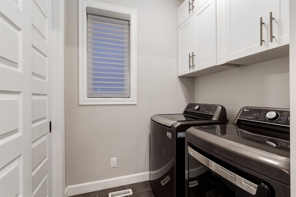 166 Osborne Common Sw, Airdrie, AB - Indoor Photo Showing Laundry Room