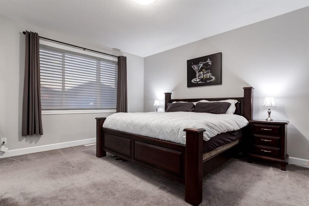 166 Osborne Common Sw, Airdrie, AB - Indoor Photo Showing Bedroom