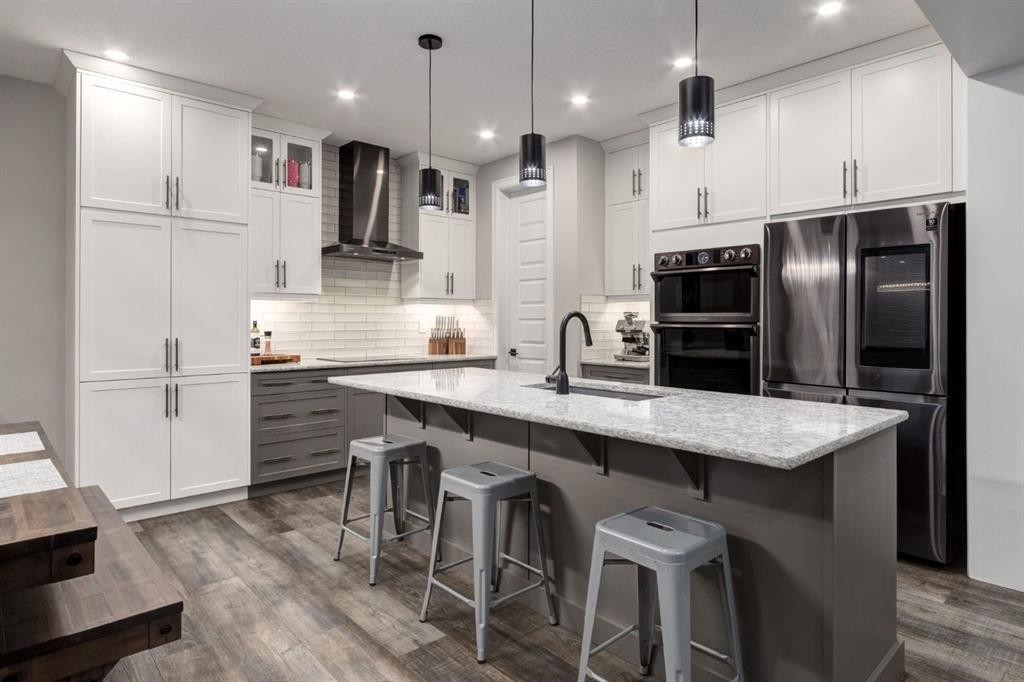 166 Osborne Common Sw, Airdrie, AB - Indoor Photo Showing Kitchen With Upgraded Kitchen