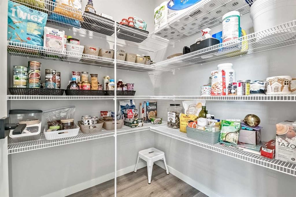68 Wolf Gate, Okotoks, AB - Indoor With Storage