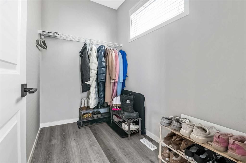 68 Wolf Gate, Okotoks, AB - Indoor With Storage