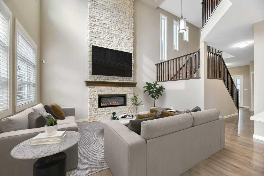 29 Aspen Summit Point Sw, Calgary, AB - Indoor Photo Showing Living Room With Fireplace