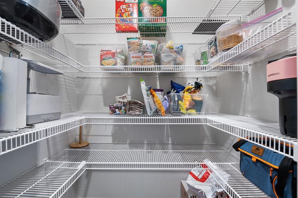 308 Lucas Way Nw, Calgary, AB - Indoor With Storage