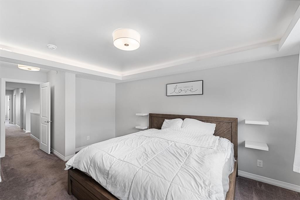 308 Lucas Way Nw, Calgary, AB - Indoor Photo Showing Bedroom