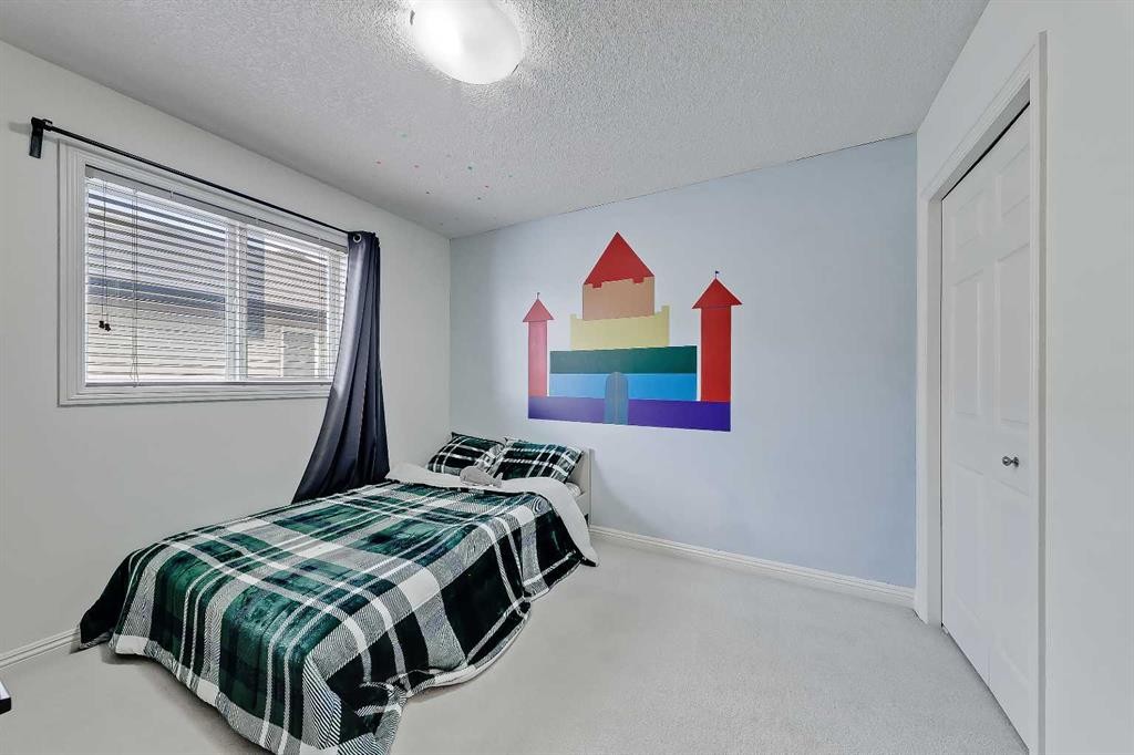 196 Hawkmere Way, Chestermere, AB - Indoor Photo Showing Bedroom