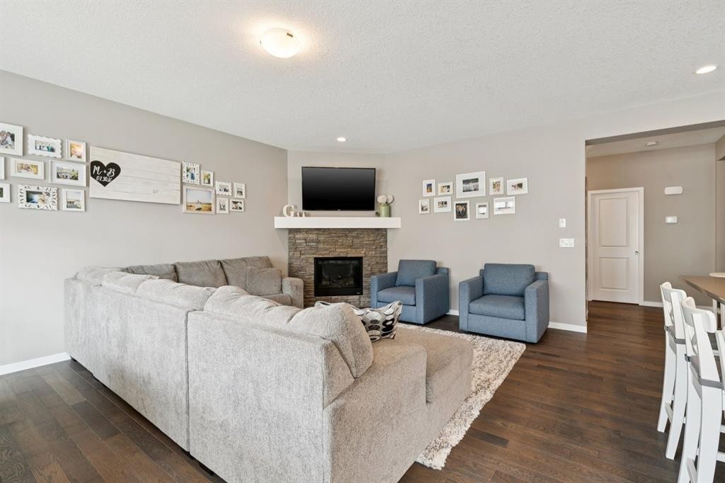 80 Brightoncrest Point Se, Calgary, AB - Indoor Photo Showing Living Room With Fireplace