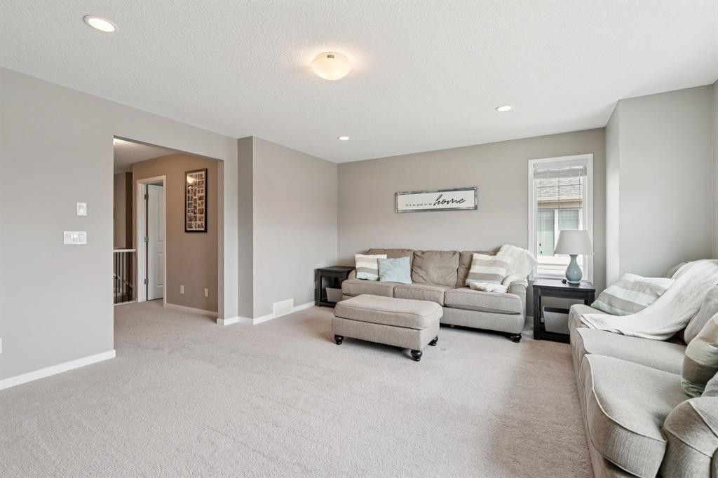 80 Brightoncrest Point Se, Calgary, AB - Indoor Photo Showing Living Room