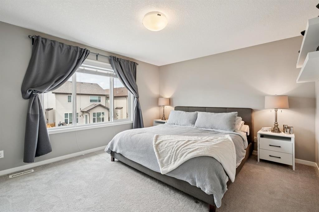 80 Brightoncrest Point Se, Calgary, AB - Indoor Photo Showing Bedroom