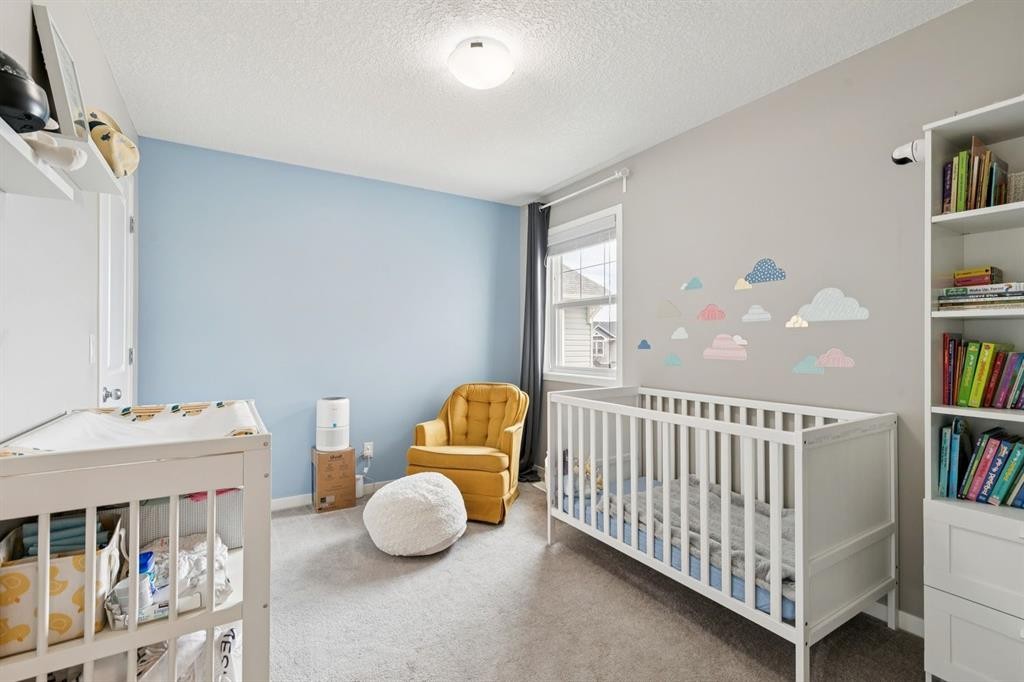 80 Brightoncrest Point Se, Calgary, AB - Indoor Photo Showing Bedroom