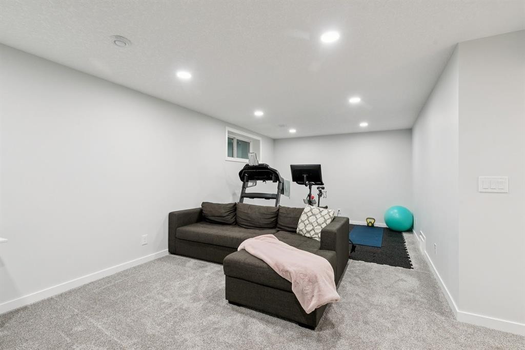 80 Brightoncrest Point Se, Calgary, AB - Indoor Photo Showing Basement