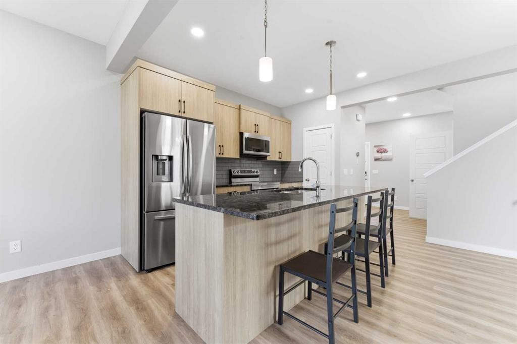 132 Highview Gate Se, Airdrie, AB - Indoor Photo Showing Kitchen With Upgraded Kitchen