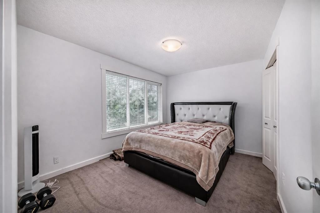 104 Panamount Terrace Nw, Calgary, AB - Indoor Photo Showing Bedroom