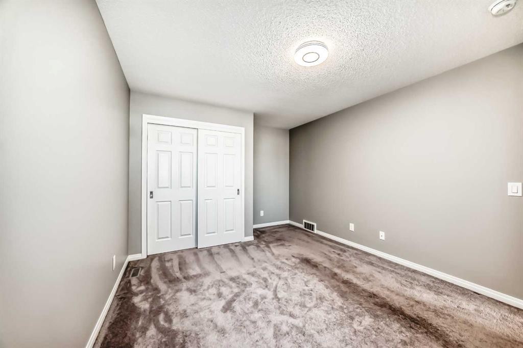 147 Windford Crescent Sw, Airdrie, AB - Indoor Photo Showing Other Room