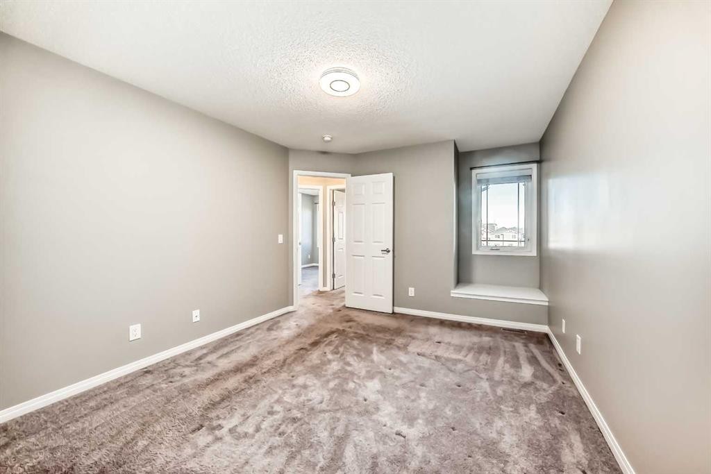 147 Windford Crescent Sw, Airdrie, AB - Indoor Photo Showing Other Room