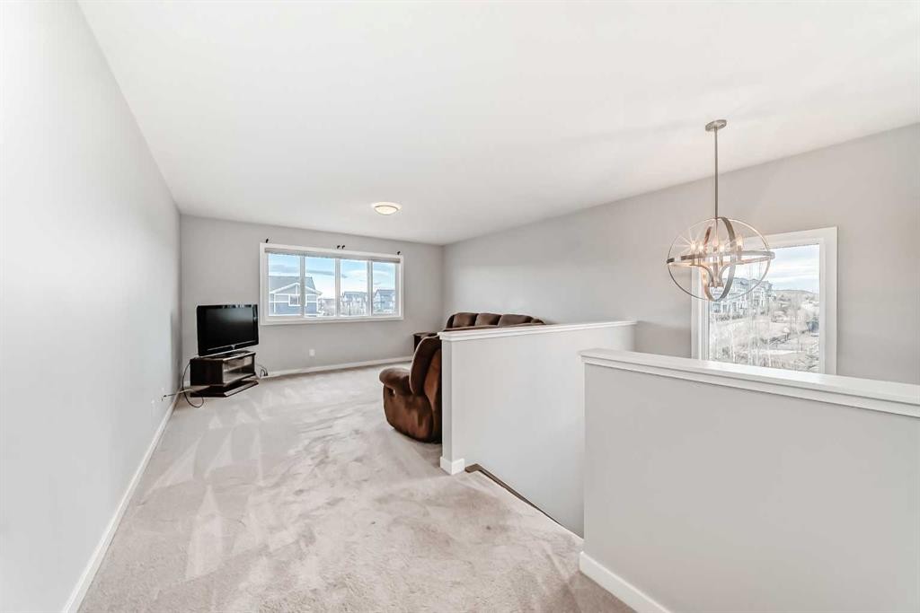 151 Sundown Way, Cochrane, AB - Indoor Photo Showing Other Room