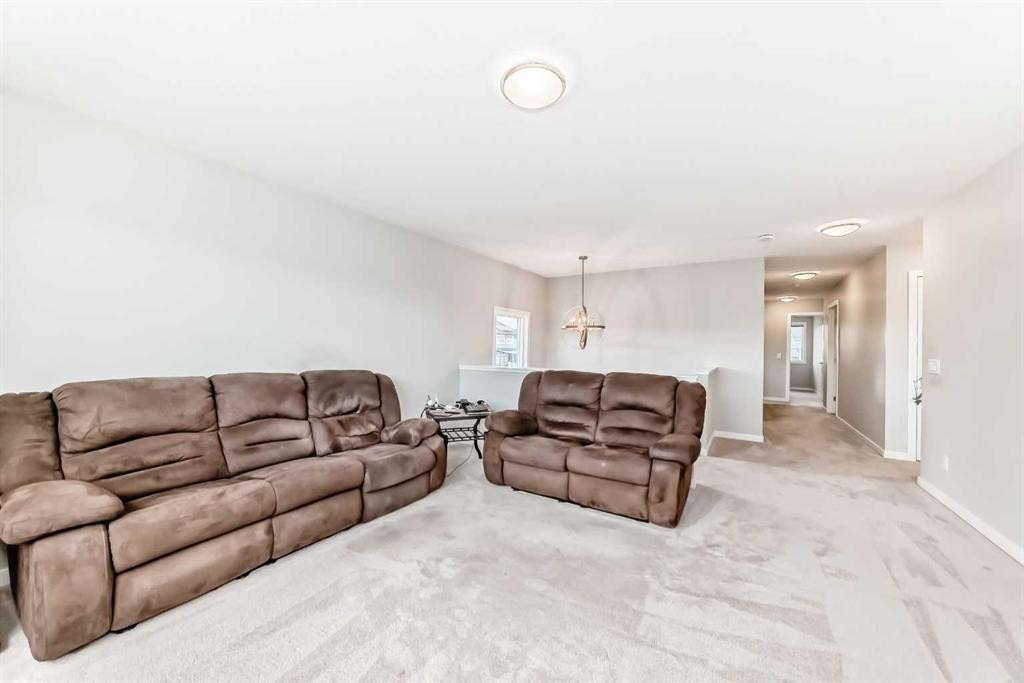 151 Sundown Way, Cochrane, AB - Indoor Photo Showing Living Room