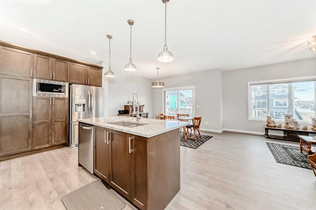 151 Sundown Way, Cochrane, AB - Indoor Photo Showing Kitchen With Upgraded Kitchen
