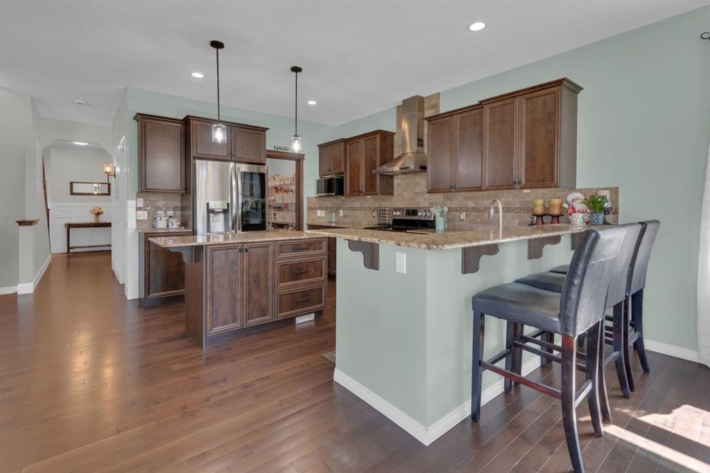 69 Morningside Circle Sw, Airdrie, AB - Indoor Photo Showing Kitchen With Upgraded Kitchen