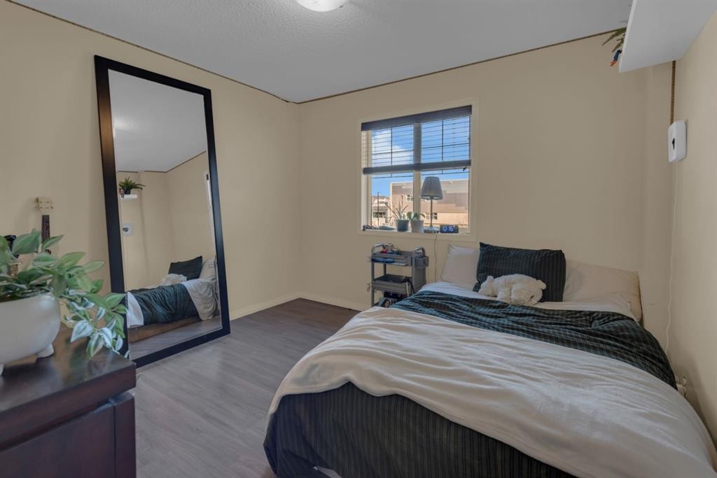 69 Morningside Circle Sw, Airdrie, AB - Indoor Photo Showing Bedroom
