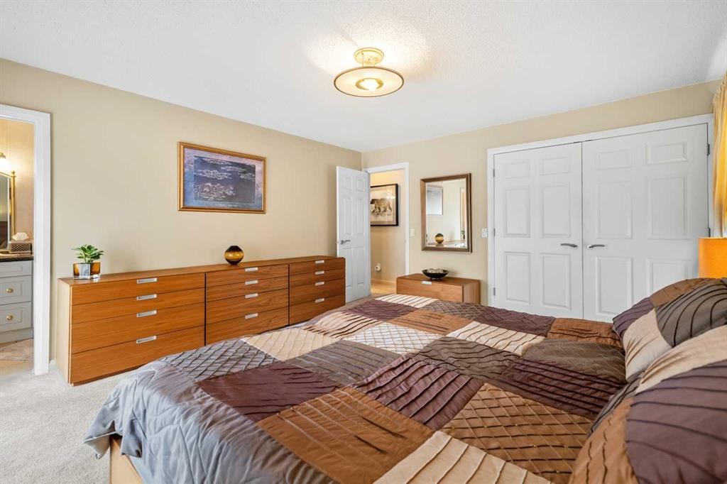 91 Sun Valley Drive Se, Calgary, AB - Indoor Photo Showing Bedroom