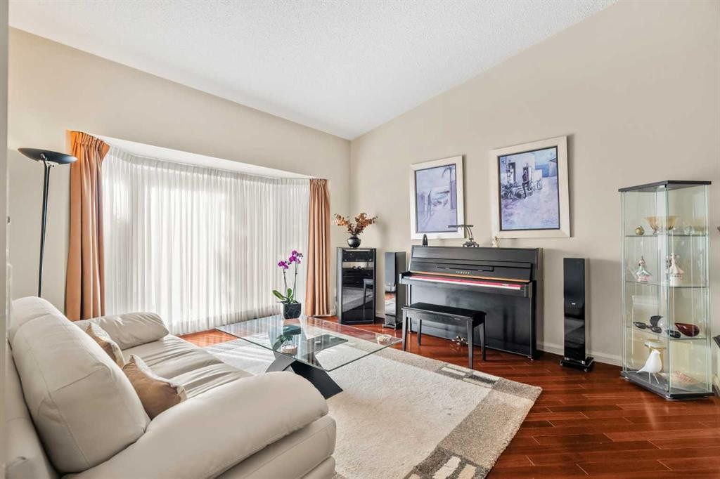 91 Sun Valley Drive Se, Calgary, AB - Indoor Photo Showing Living Room With Fireplace