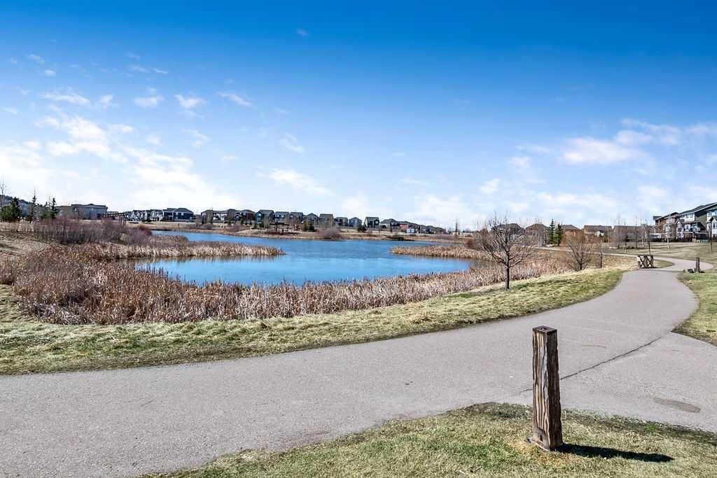 75 Sundown Way, Cochrane, AB - Outdoor With Body Of Water With View