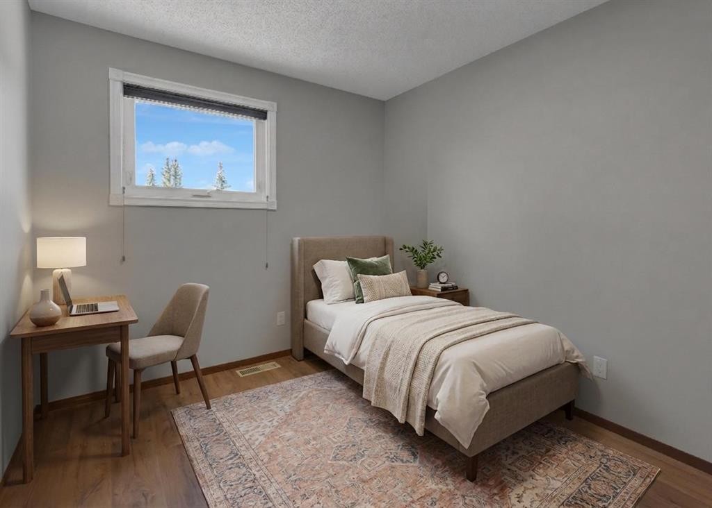 260 Hawkwood Boulevard Nw, Calgary, AB - Indoor Photo Showing Bedroom