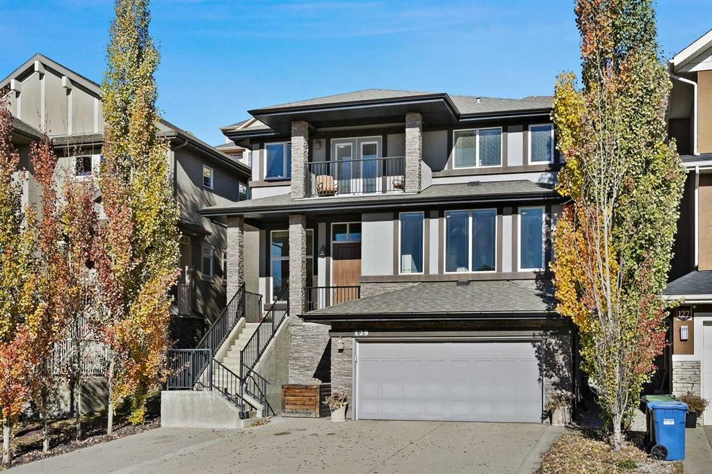 129 Springbluff Boulevard Sw, Calgary, AB - Outdoor With Facade