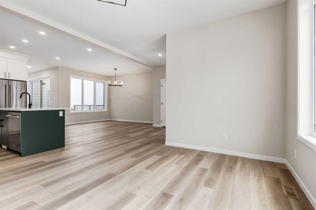 26 Alpine Gardens Sw, Calgary, AB - Indoor Photo Showing Kitchen With Upgraded Kitchen