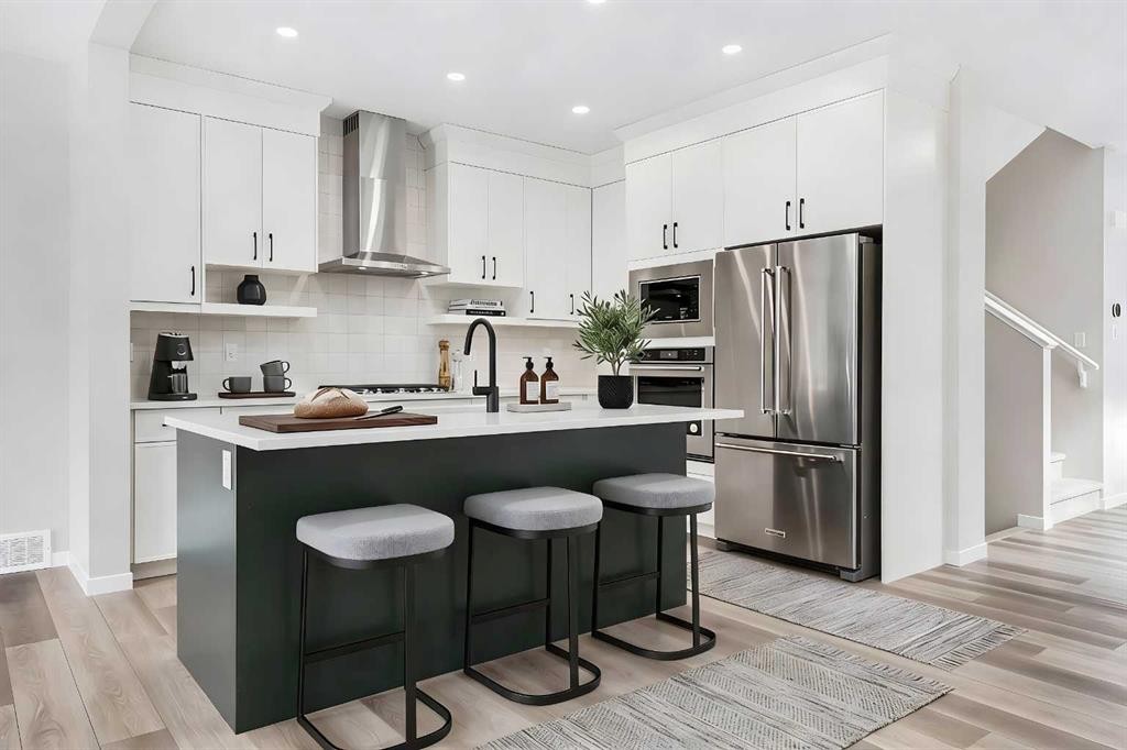 26 Alpine Gardens Sw, Calgary, AB - Indoor Photo Showing Kitchen With Upgraded Kitchen