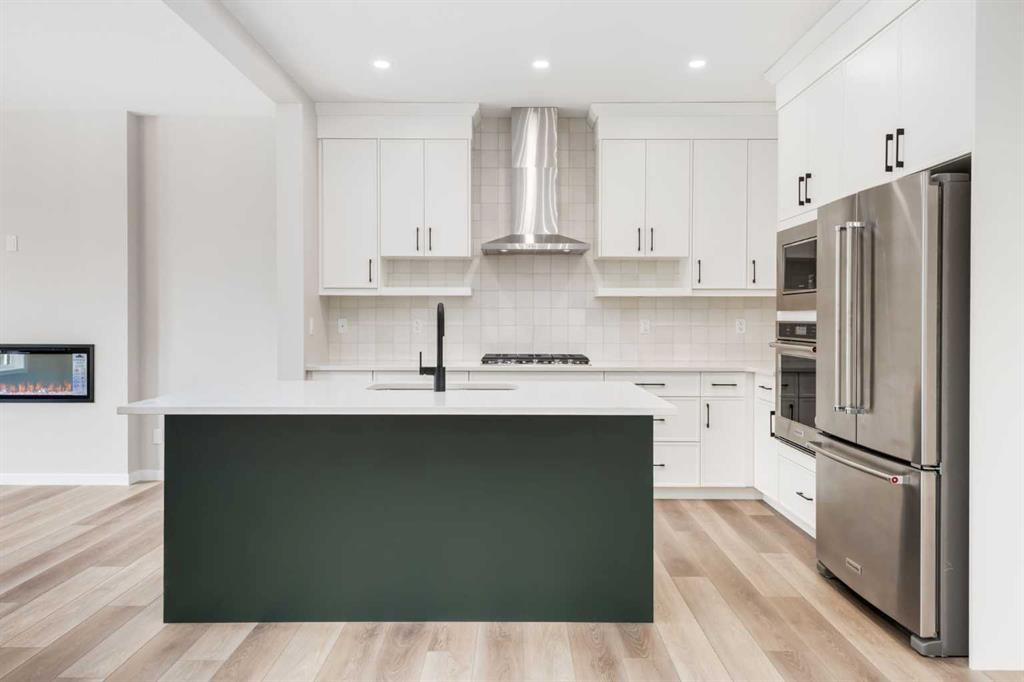 26 Alpine Gardens Sw, Calgary, AB - Indoor Photo Showing Kitchen With Upgraded Kitchen