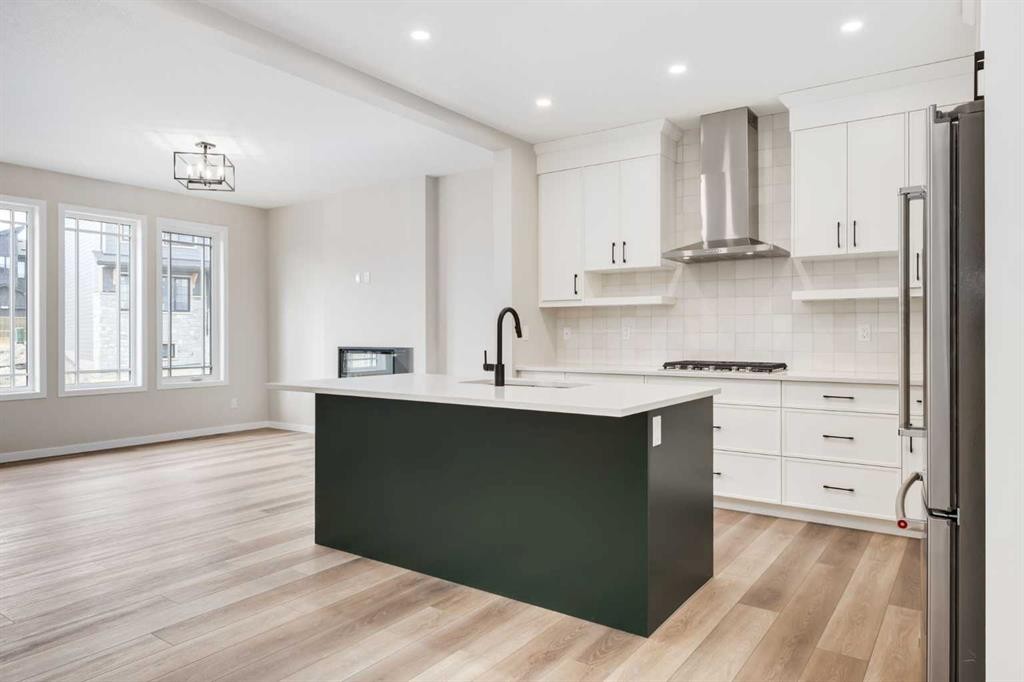 26 Alpine Gardens Sw, Calgary, AB - Indoor Photo Showing Kitchen With Upgraded Kitchen