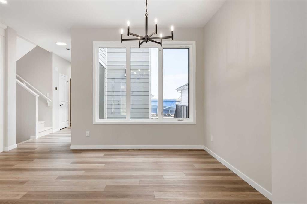 26 Alpine Gardens Sw, Calgary, AB - Indoor Photo Showing Other Room