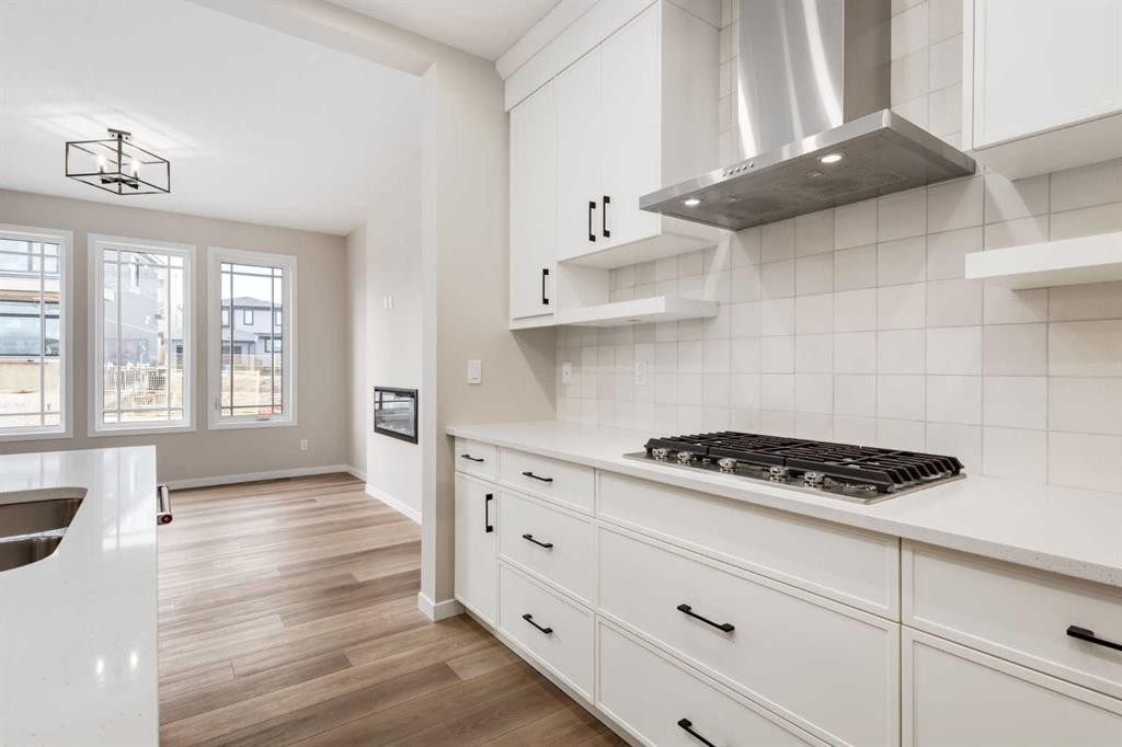 26 Alpine Gardens Sw, Calgary, AB - Indoor Photo Showing Kitchen With Upgraded Kitchen