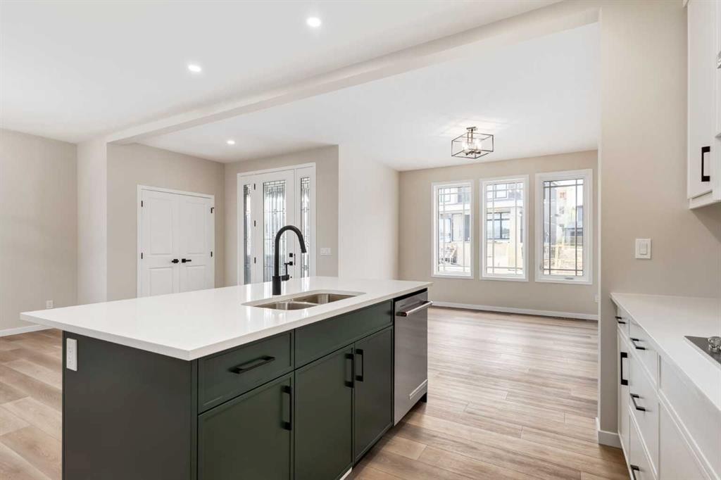 26 Alpine Gardens Sw, Calgary, AB - Indoor Photo Showing Kitchen With Double Sink With Upgraded Kitchen