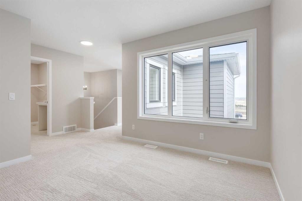 26 Alpine Gardens Sw, Calgary, AB - Indoor Photo Showing Other Room