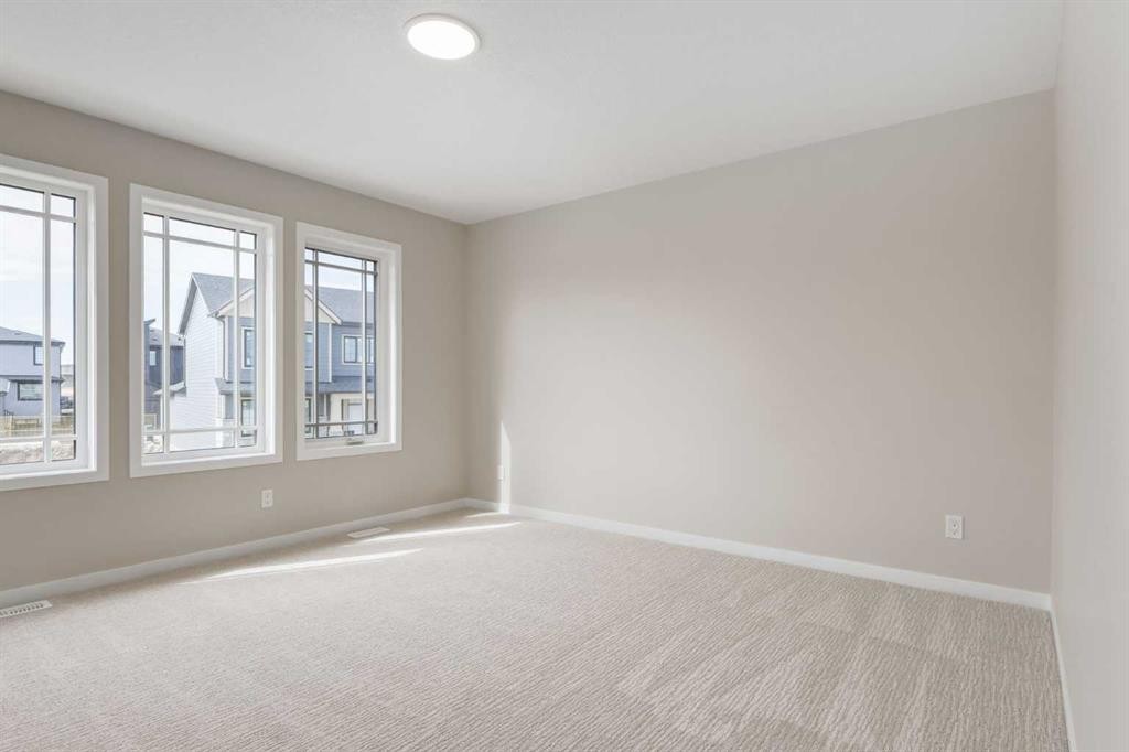 26 Alpine Gardens Sw, Calgary, AB - Indoor Photo Showing Other Room