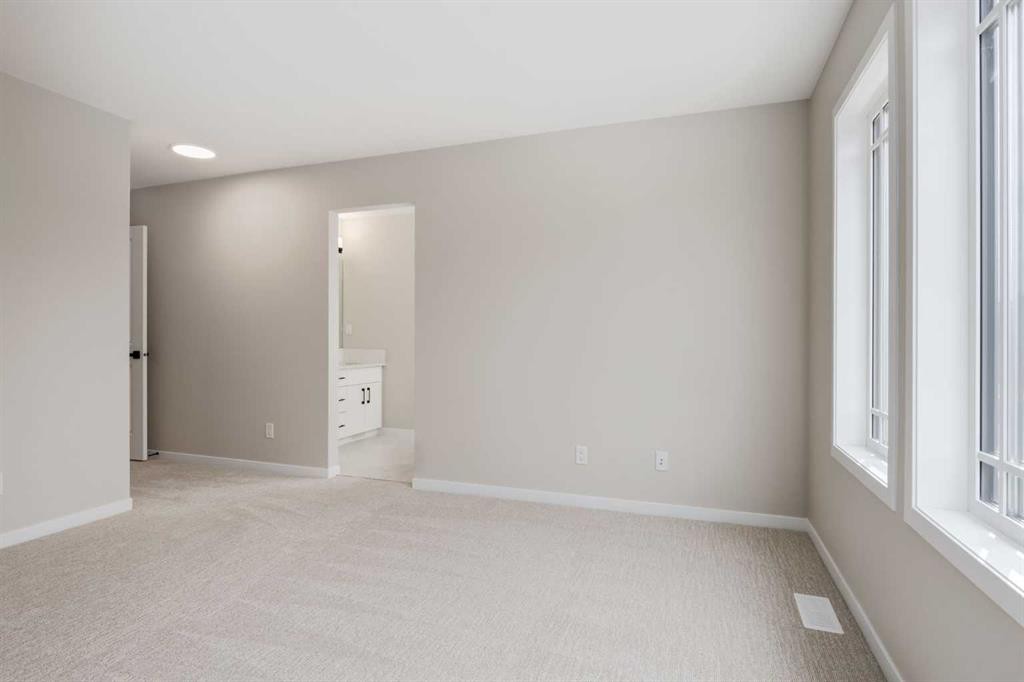 26 Alpine Gardens Sw, Calgary, AB - Indoor Photo Showing Other Room