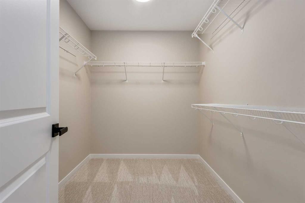 26 Alpine Gardens Sw, Calgary, AB - Indoor With Storage