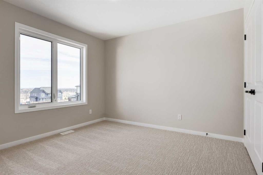 26 Alpine Gardens Sw, Calgary, AB - Indoor Photo Showing Other Room